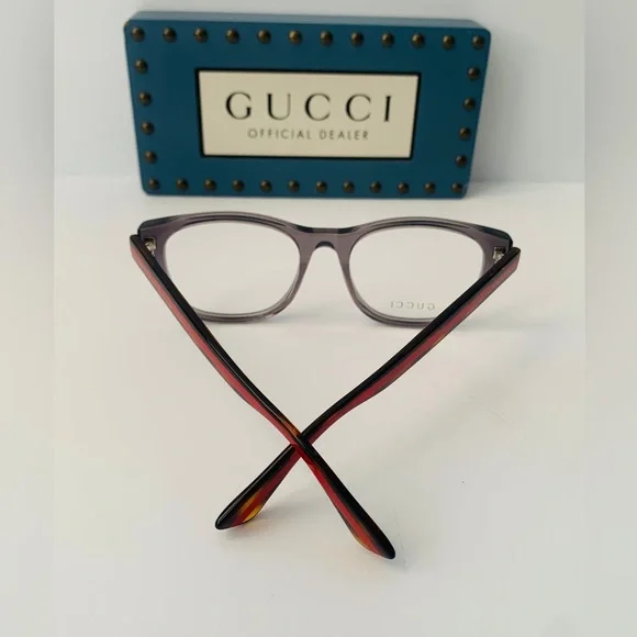 Gucci's GG0004ON features soft lines frames acetate front. Iconic web effect